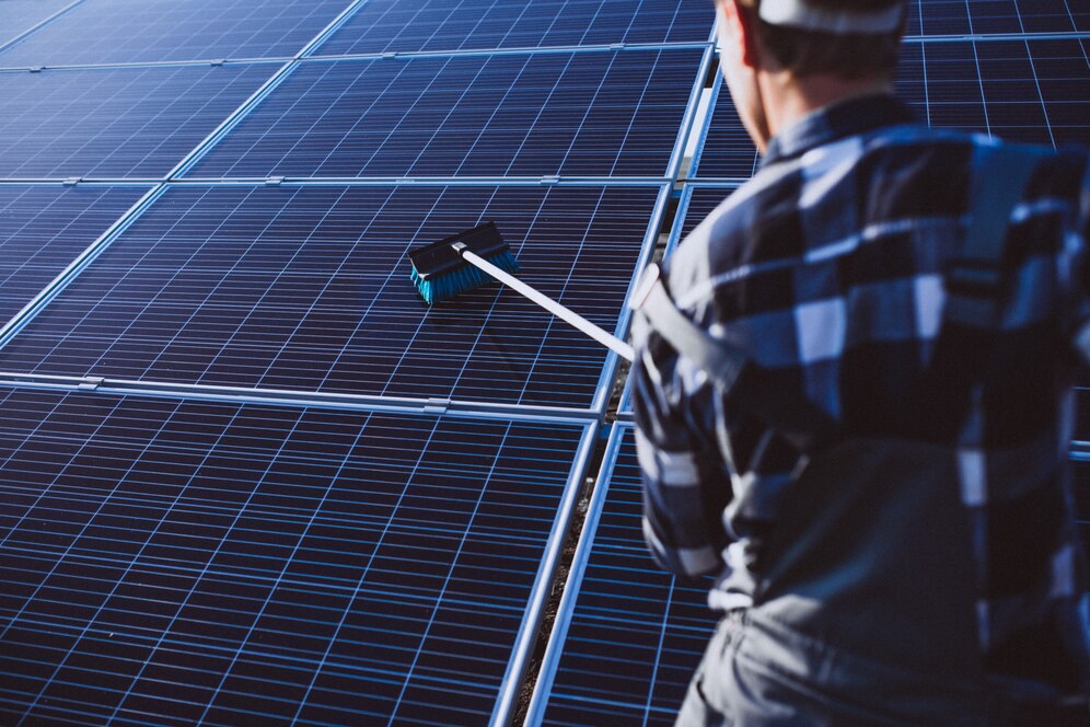 cleaning solar panels on a pitched roof